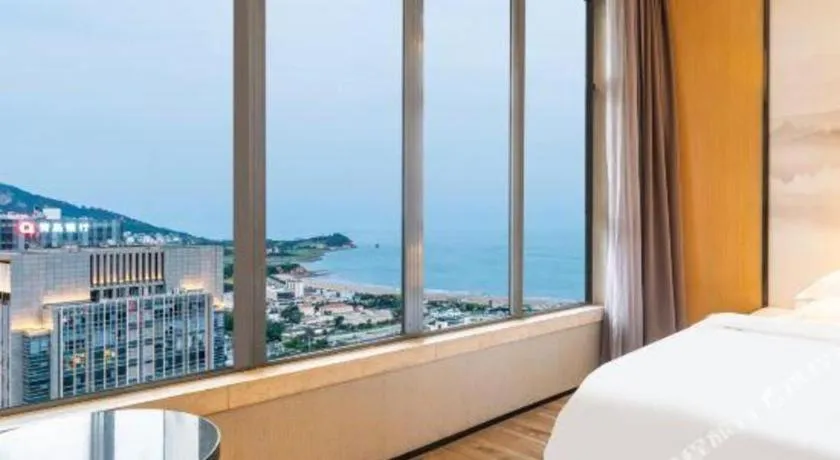 Bed in Qingdao Elegance Hotel