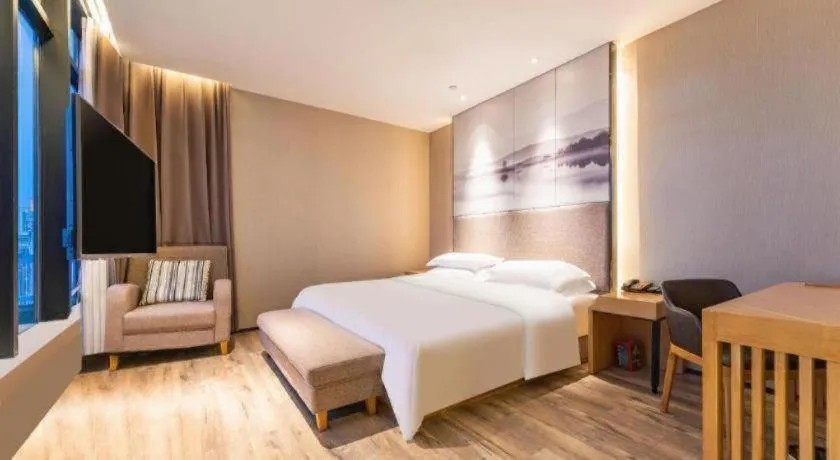 Bed in Qingdao Elegance Hotel