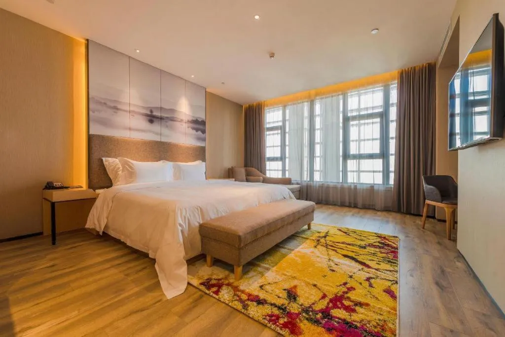 Bed in Qingdao Elegance Hotel