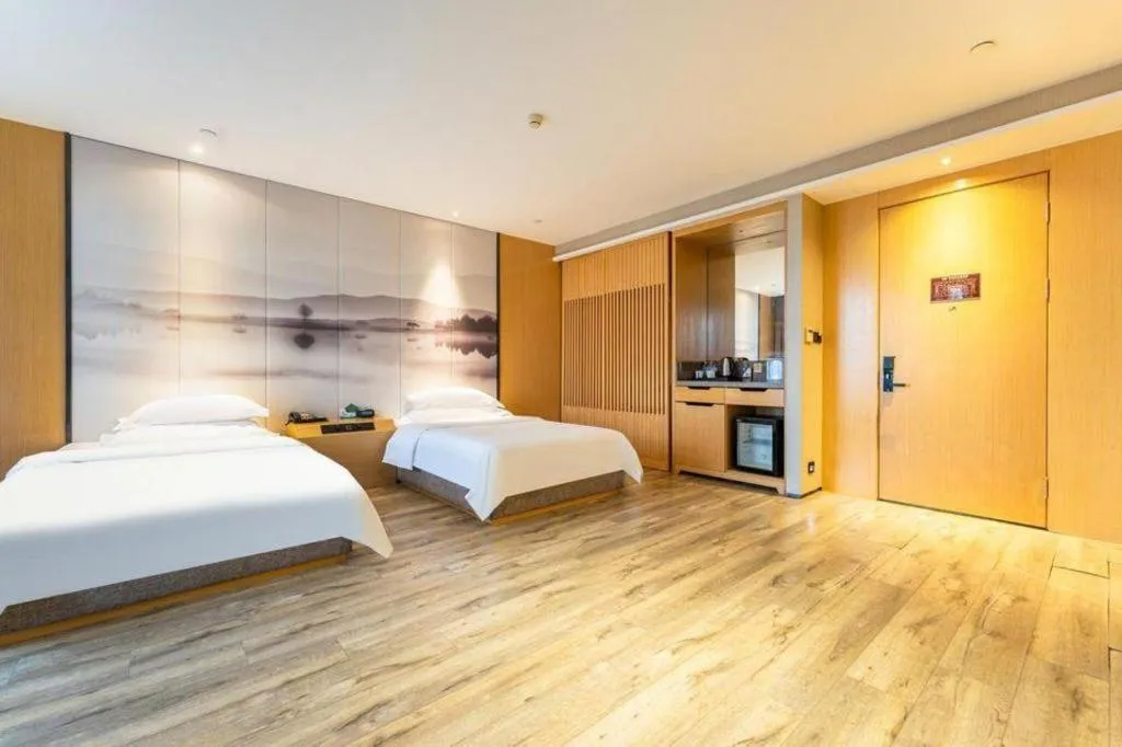 Bed in Qingdao Elegance Hotel