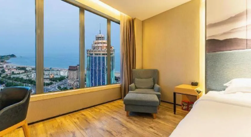 Bed in Qingdao Elegance Hotel