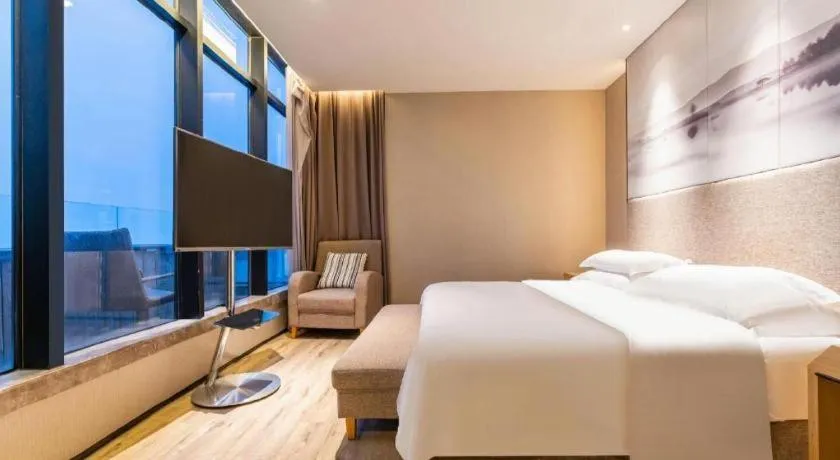 Bed in Qingdao Elegance Hotel