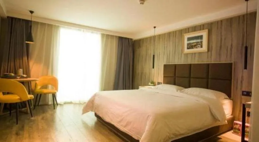 Bed in Qingdao Elegance Hotel