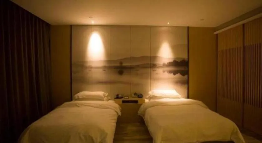 Bed in Qingdao Elegance Hotel