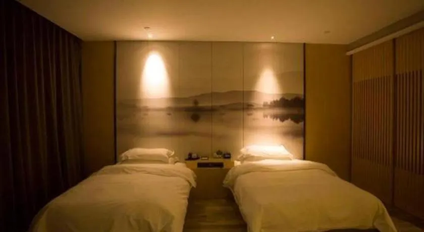 Bed in Qingdao Elegance Hotel