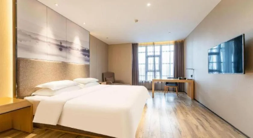 Bed in Qingdao Elegance Hotel