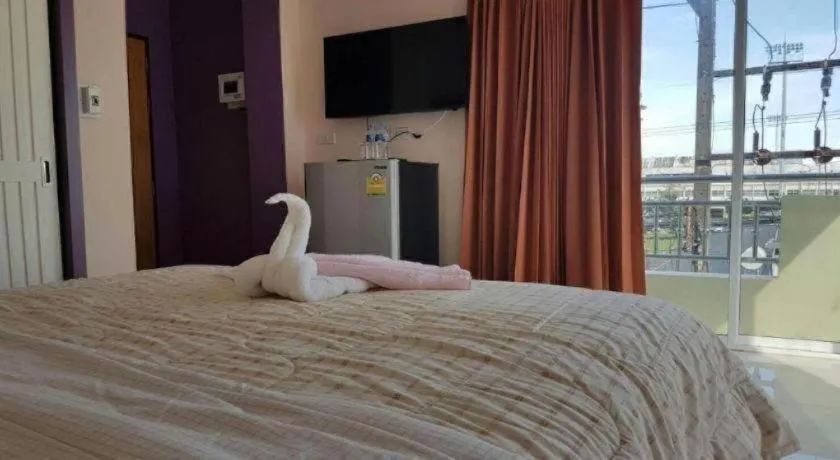 Bed in V-House Hotel