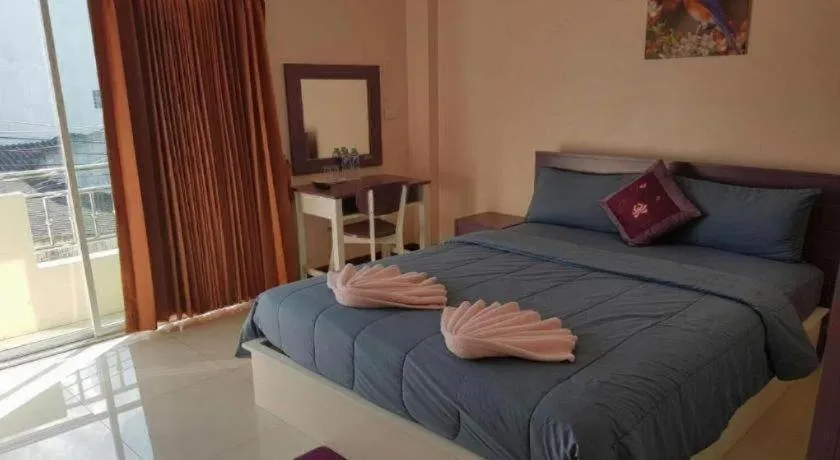 Bed in V-House Hotel