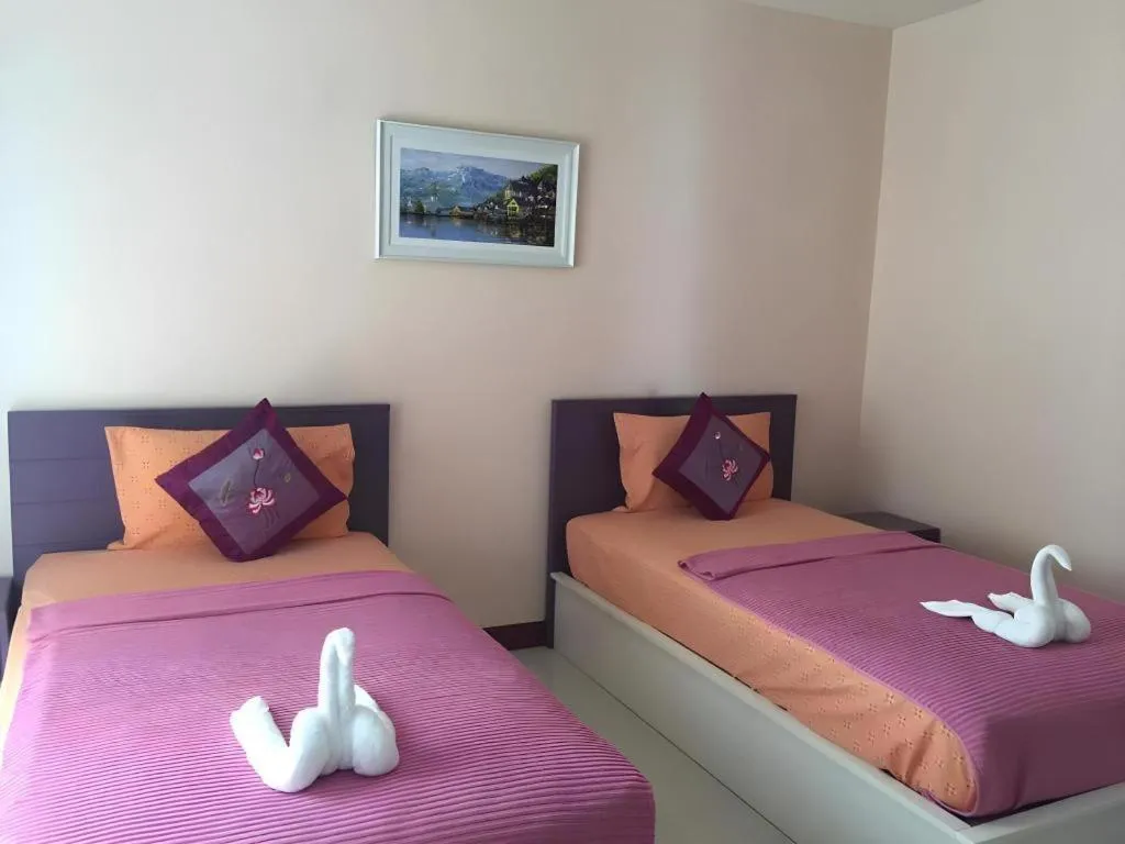 Bed in V-House Hotel