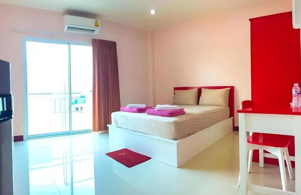 Bed in V-House Hotel