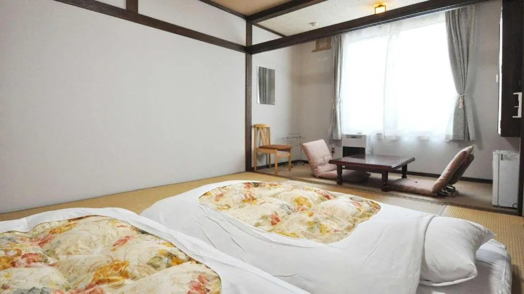 Bed in Yunosawa Onsen Mori no Shiki