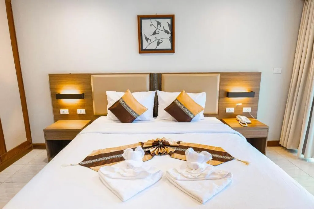 Bed in The Impress Nan Hotel