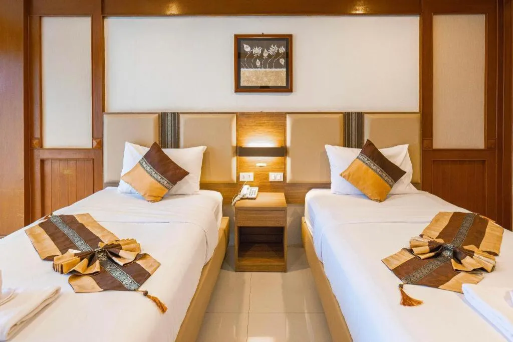 Bed in The Impress Nan Hotel