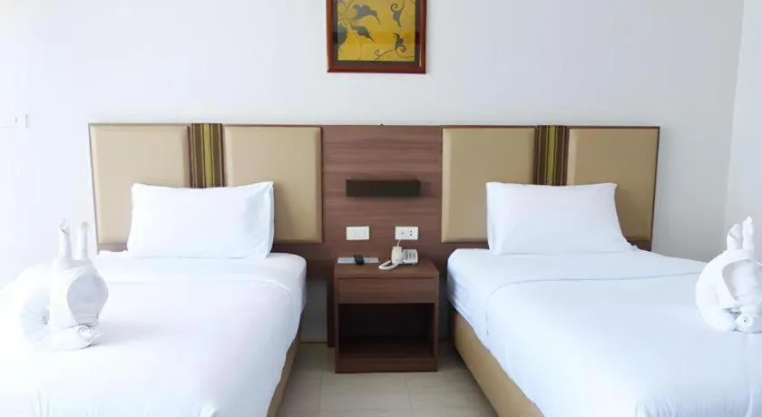 Bed in The Impress Nan Hotel