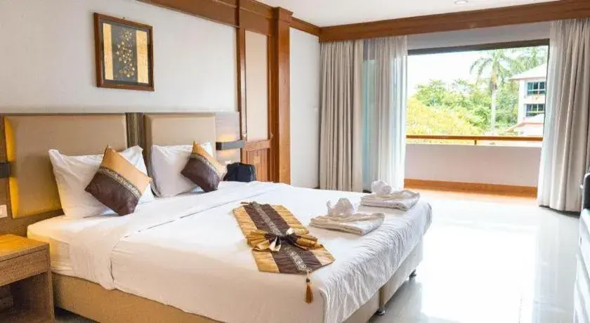 Bed in The Impress Nan Hotel Bed in The Impress Nan Hotel