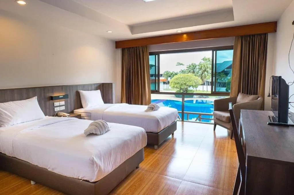 Bed in The Impress Nan Hotel