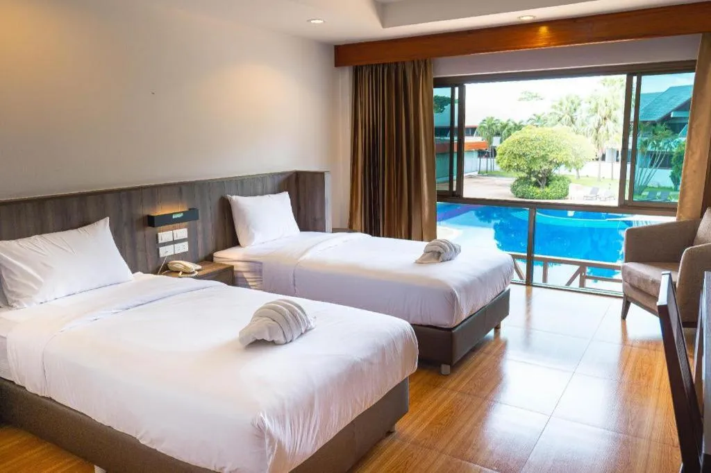 Bed in The Impress Nan Hotel