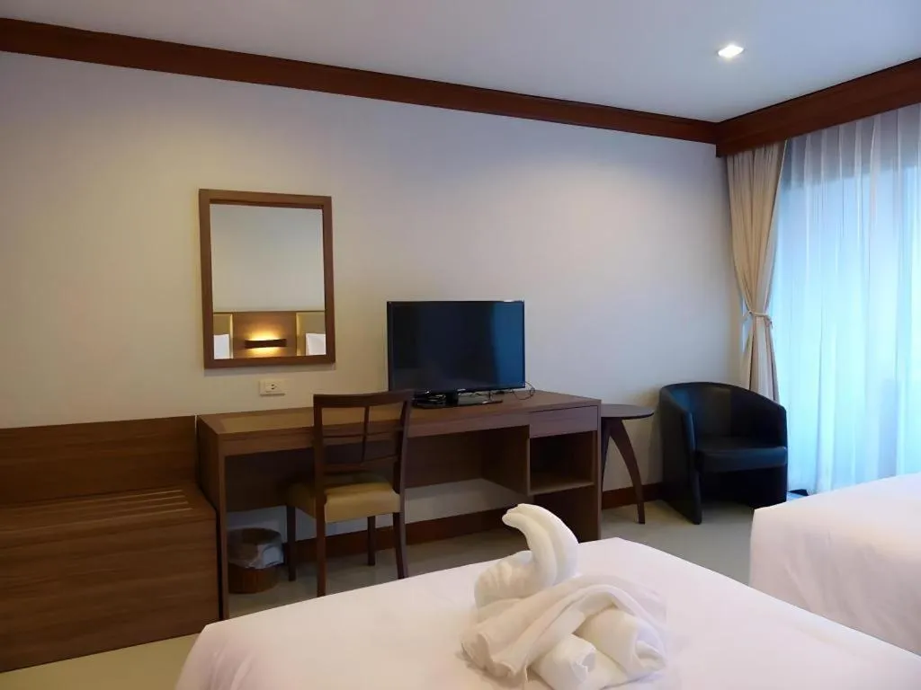 Bed in The Impress Nan Hotel