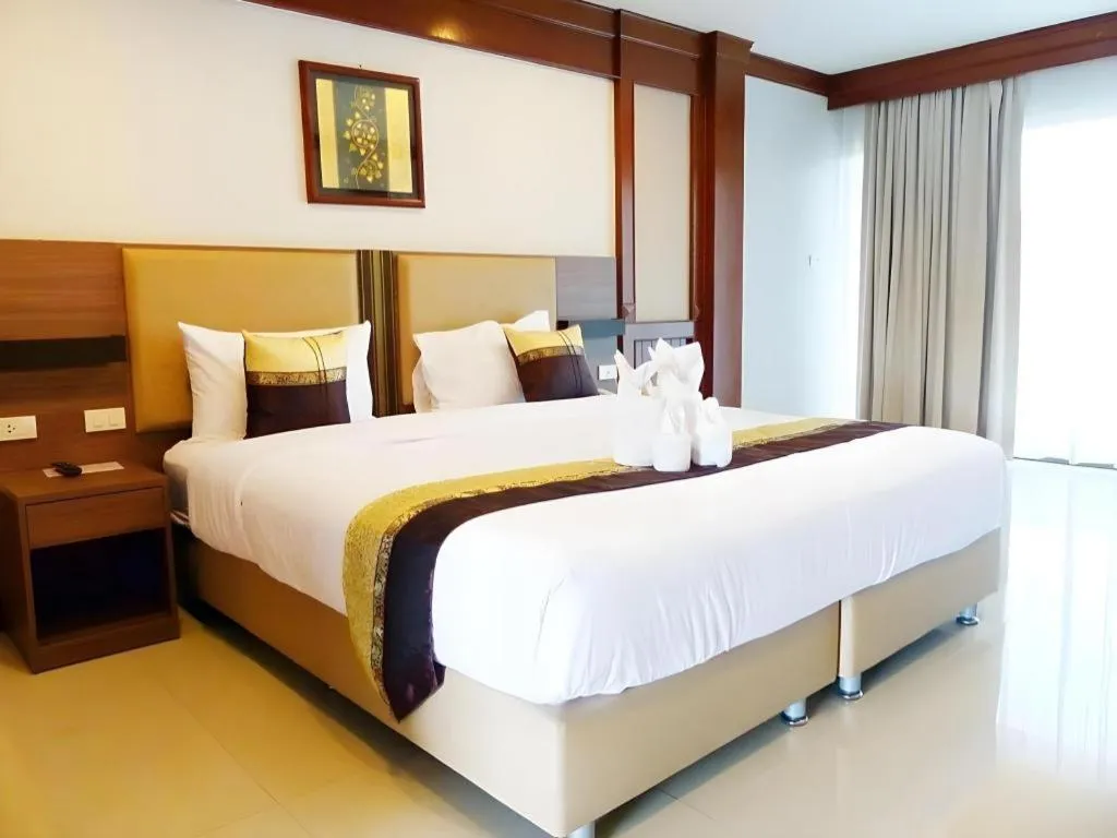 Bed in The Impress Nan Hotel