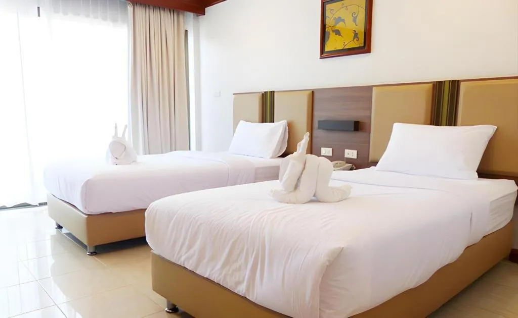 Bed in The Impress Nan Hotel