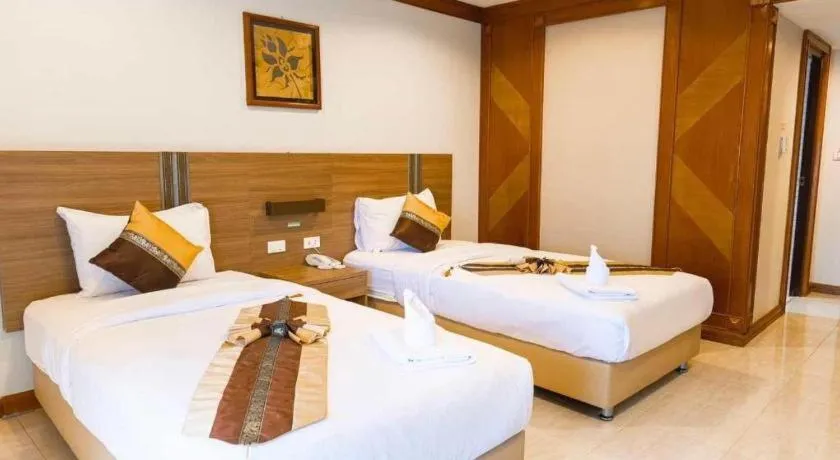 Bed in The Impress Nan Hotel