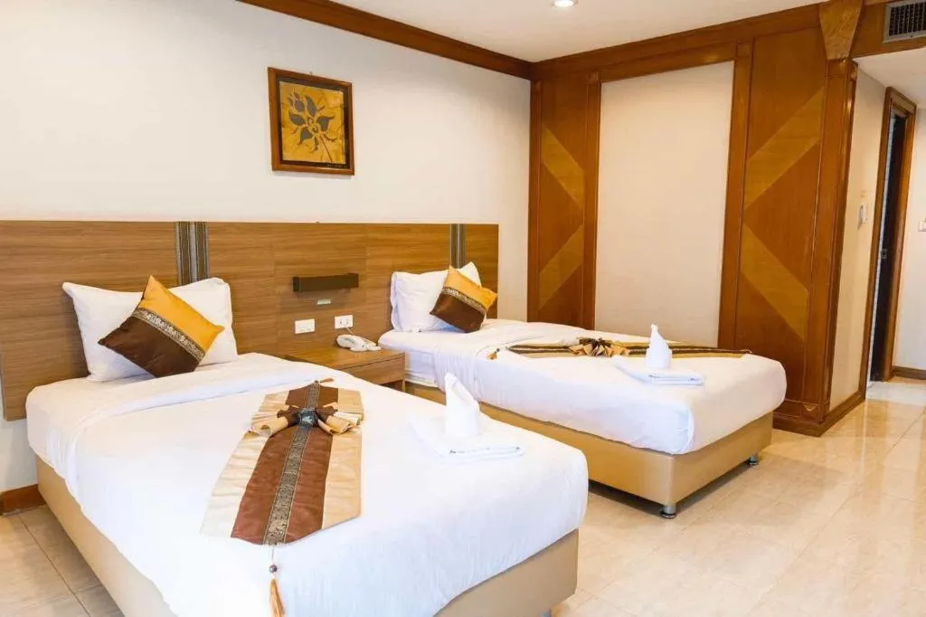 Bed in The Impress Nan Hotel