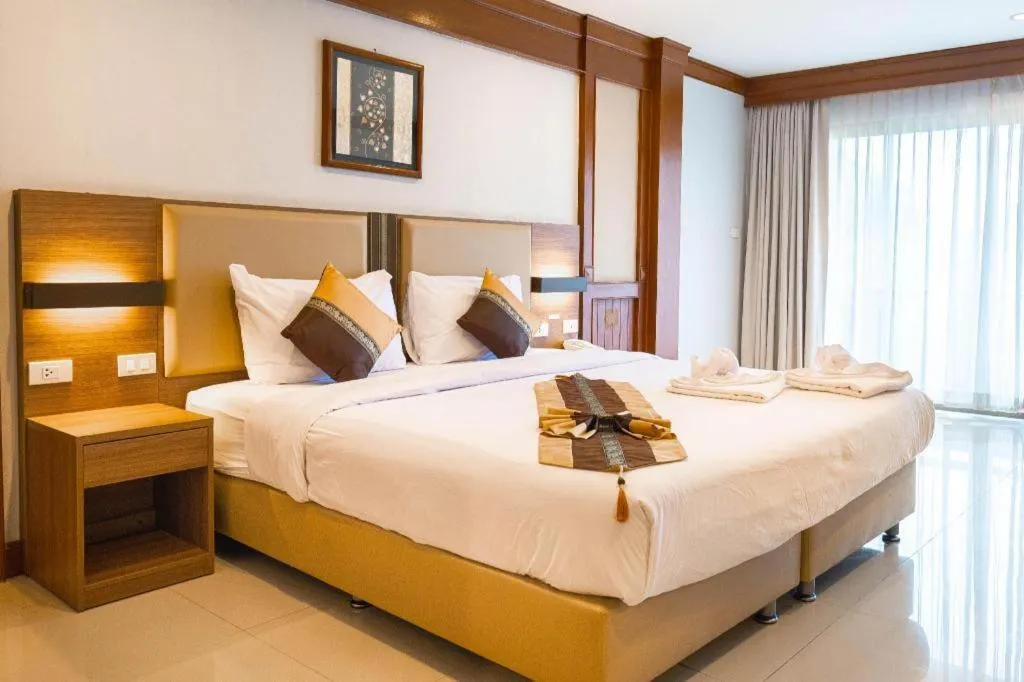 Bed in The Impress Nan Hotel