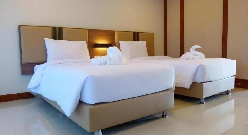 Bed in The Impress Nan Hotel