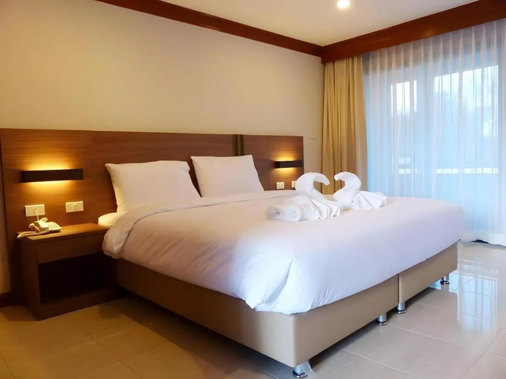 Bed in The Impress Nan Hotel