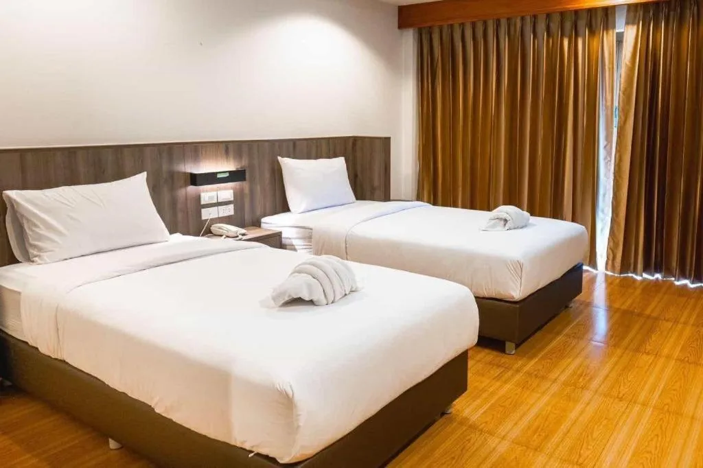 Bed in The Impress Nan Hotel