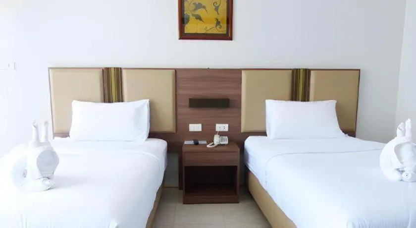 Bed in The Impress Nan Hotel