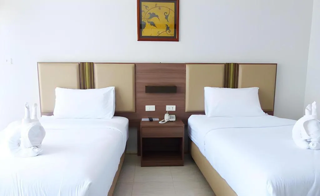 Bed in The Impress Nan Hotel