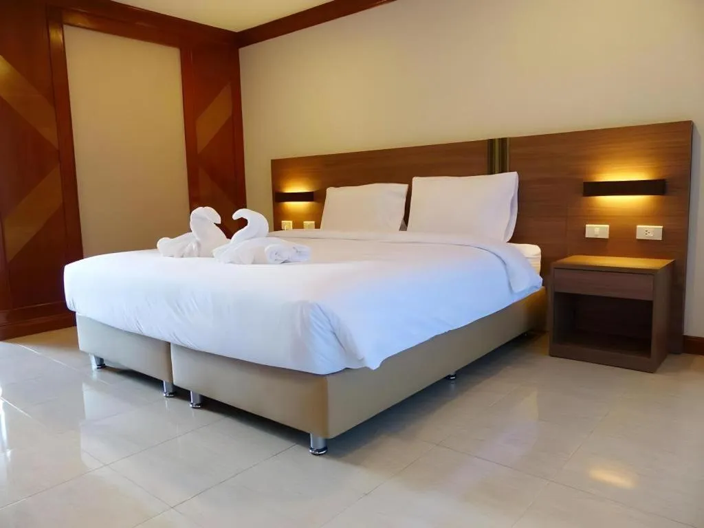 Bed in The Impress Nan Hotel