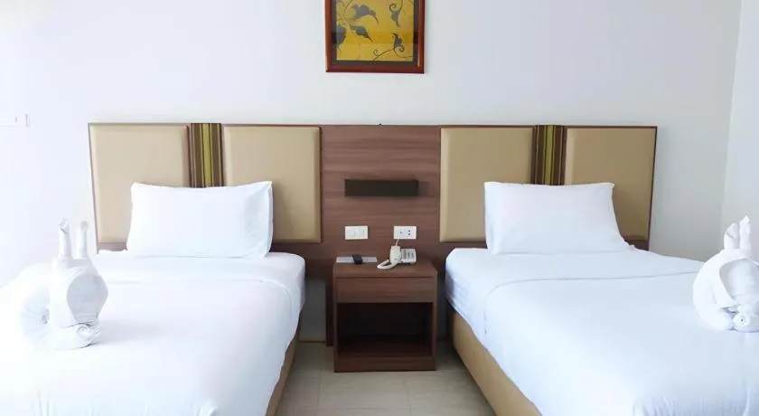 Bed in The Impress Nan Hotel