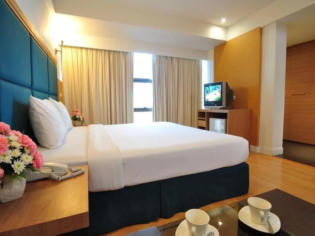 Bed in Mayflower Grande Hotel