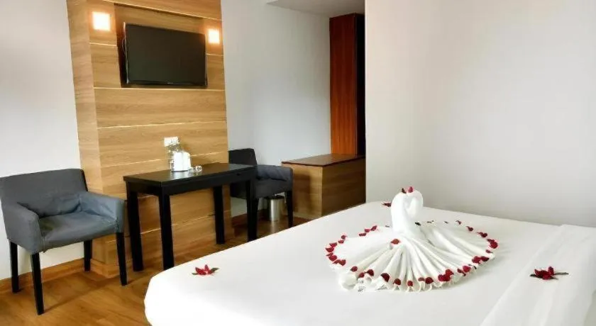 Bed in Mayflower Grande Hotel