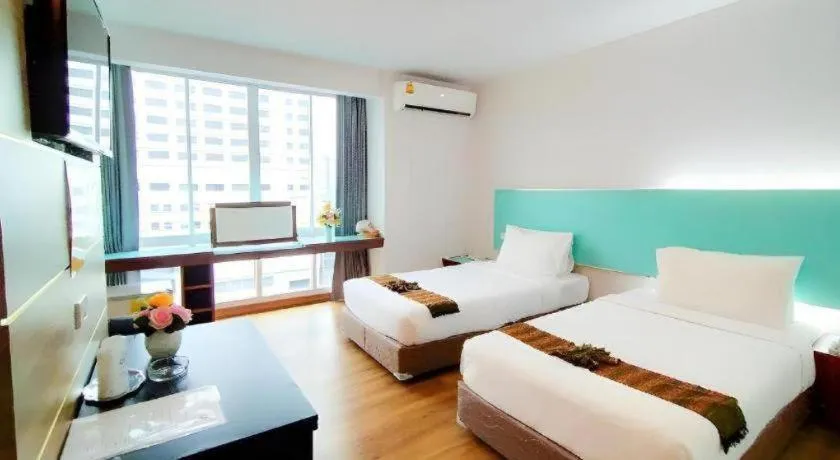 Bed in Mayflower Grande Hotel