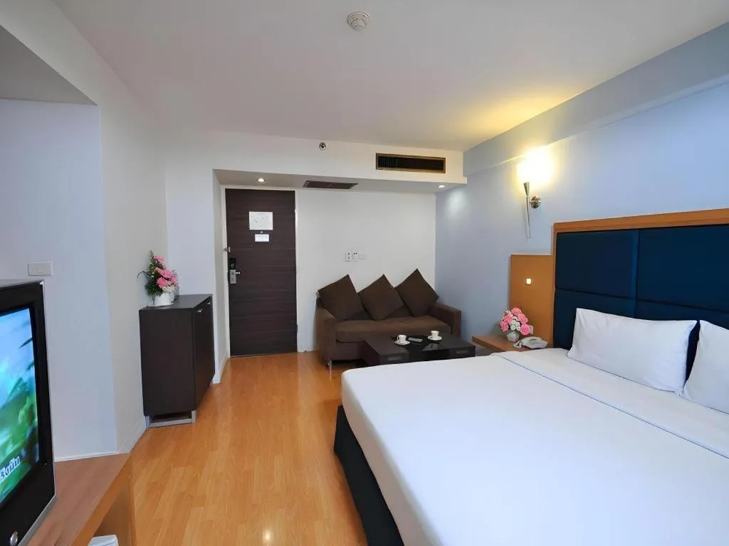 Bed in Mayflower Grande Hotel