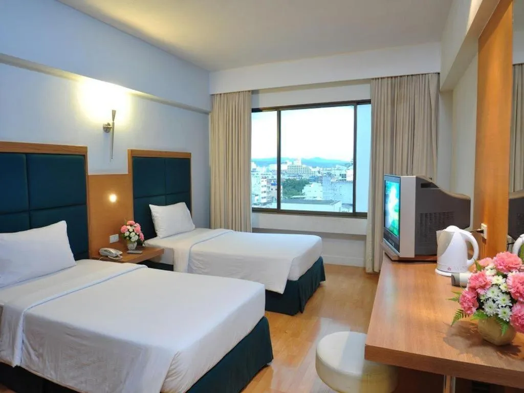 Bed in Mayflower Grande Hotel