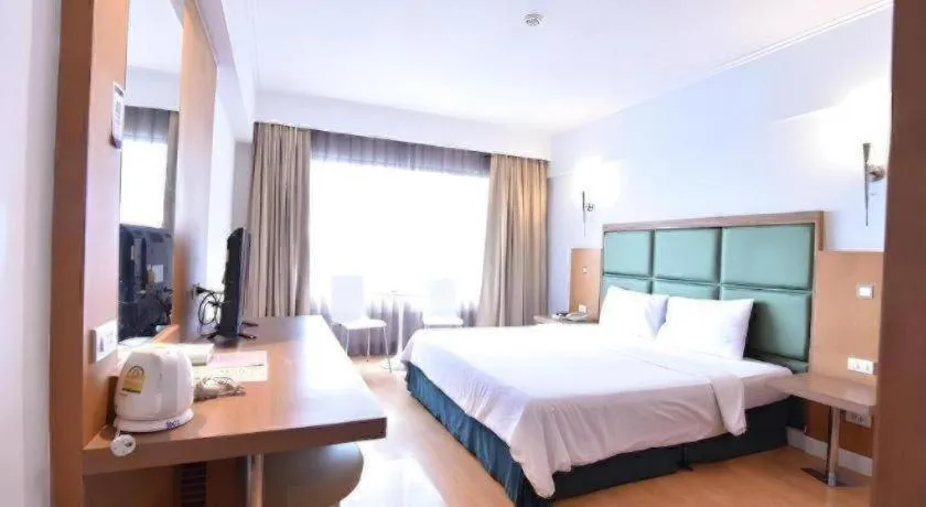 Bed in Mayflower Grande Hotel