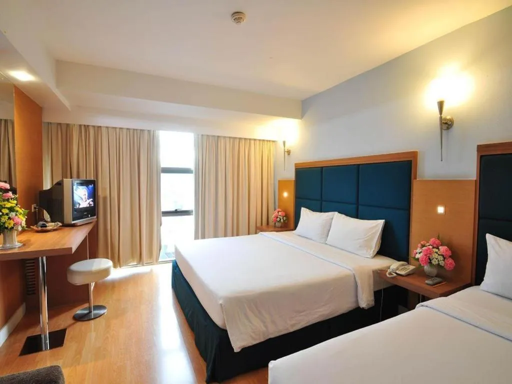 Bed in Mayflower Grande Hotel