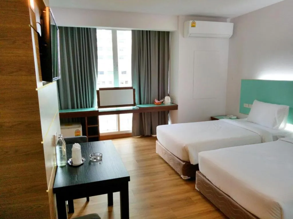 Bed in Mayflower Grande Hotel