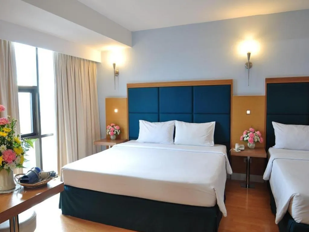 Bed in Mayflower Grande Hotel