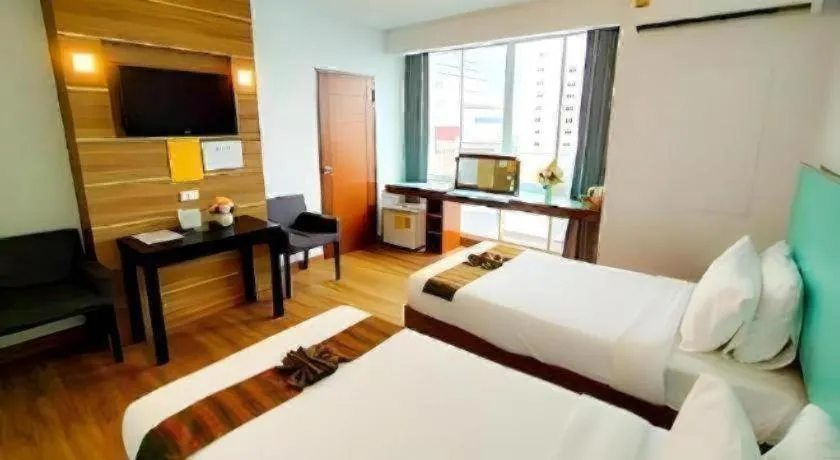 Bed in Mayflower Grande Hotel