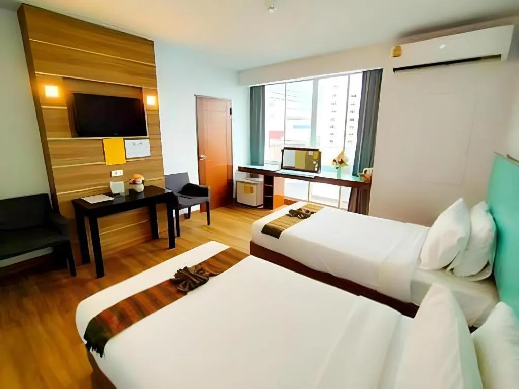 Bed in Mayflower Grande Hotel