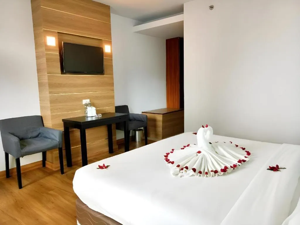 Bed in Mayflower Grande Hotel