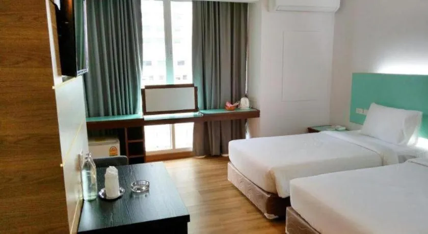 Bed in Mayflower Grande Hotel