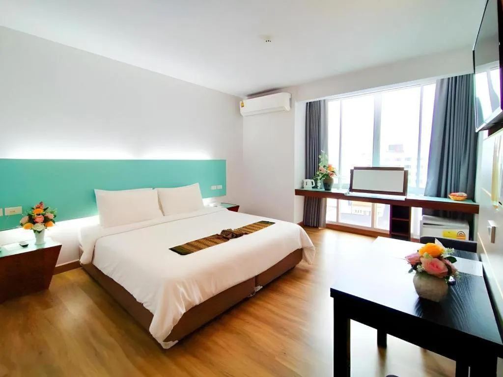 Bed in Mayflower Grande Hotel