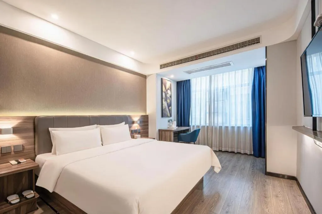 Bed in 7 Days Inn Yingshang Lanxing Building Materials Market