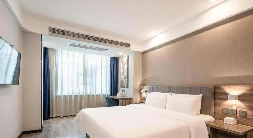 Bed in 7 Days Inn Yingshang Lanxing Building Materials Market